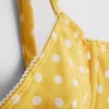 Balenciaga tel destekli, kalp yakalı, puantiyeli bikini üstü Balenciaga tel destekli, kalp yakalı, puantiyeli bikini üstü