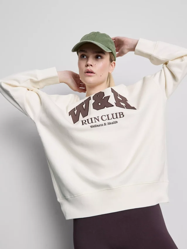 Bol kesim, pamuk ağırlıklı spor kulübü sweatshirt’ü Bol kesim, pamuk ağırlıklı spor kulübü sweatshirt’ü