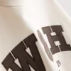 Bol kesim, pamuk ağırlıklı spor kulübü sweatshirt’ü Bol kesim, pamuk ağırlıklı spor kulübü sweatshirt’ü