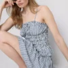 Büzgülü kareli peplum askılı bluz Büzgülü kareli peplum askılı bluz