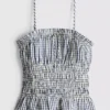 Büzgülü kareli peplum askılı bluz Büzgülü kareli peplum askılı bluz