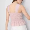 Büzgülü peplum etekli kolsuz bluz Büzgülü peplum etekli kolsuz bluz