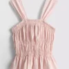 Büzgülü peplum etekli kolsuz bluz Büzgülü peplum etekli kolsuz bluz