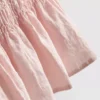 Büzgülü peplum etekli kolsuz bluz Büzgülü peplum etekli kolsuz bluz