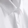 Dar kesim esnek düğmeli gömlek