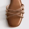 Diamanta örgülü mules sandaletler