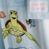 Disney Pixar’ın Finding Nemo desenli pamuklu gecelik Disney Pixar’ın Finding Nemo desenli pamuklu gecelik