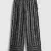 Dokulu çizgili geniş paça pantolon Dokulu çizgili geniş paça pantolon
