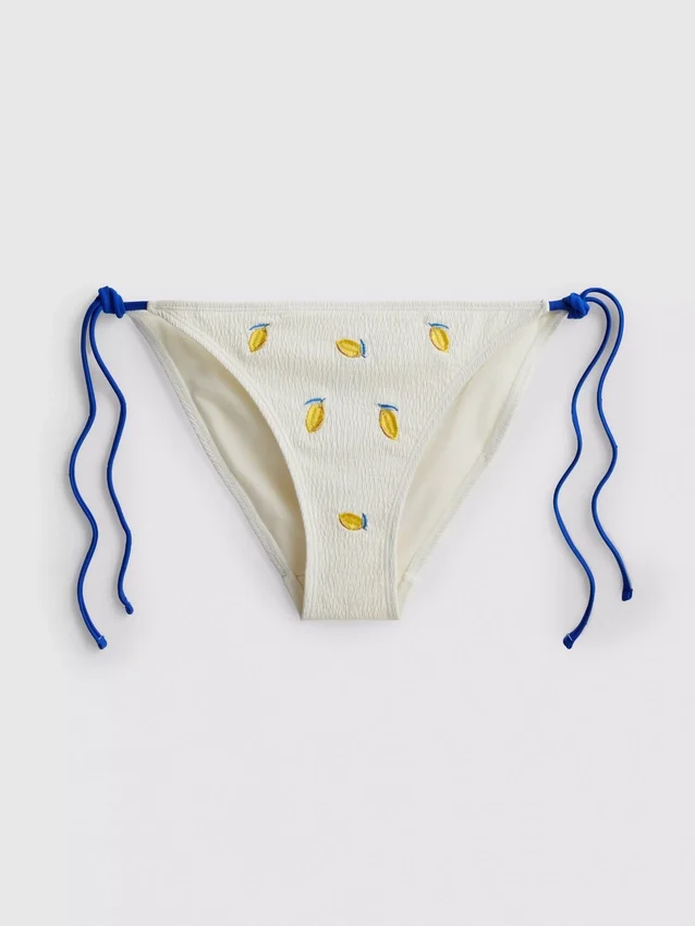 Dokulu limon desenli, yandan bağlamalı bikini altları Dokulu limon desenli, yandan bağlamalı bikini altları
