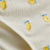 Dokulu limon desenli, yandan bağlamalı bikini altları Dokulu limon desenli, yandan bağlamalı bikini altları