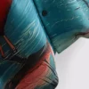 Flamingo desenli kısa kollu düğmeli şort gömleği Flamingo desenli kısa kollu düğmeli şort gömleği
