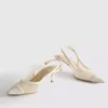 Geniş kalıplı file slingback topuklu ayakkabılar