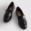 Geniş kalıplı vernikli loaferlar
