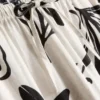 Geniş paça desenli pantolon Geniş paça desenli pantolon