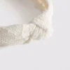 Çiçek desenli düğümlü saç bandı