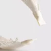 Çiçek desenli düğümlü saç bandı