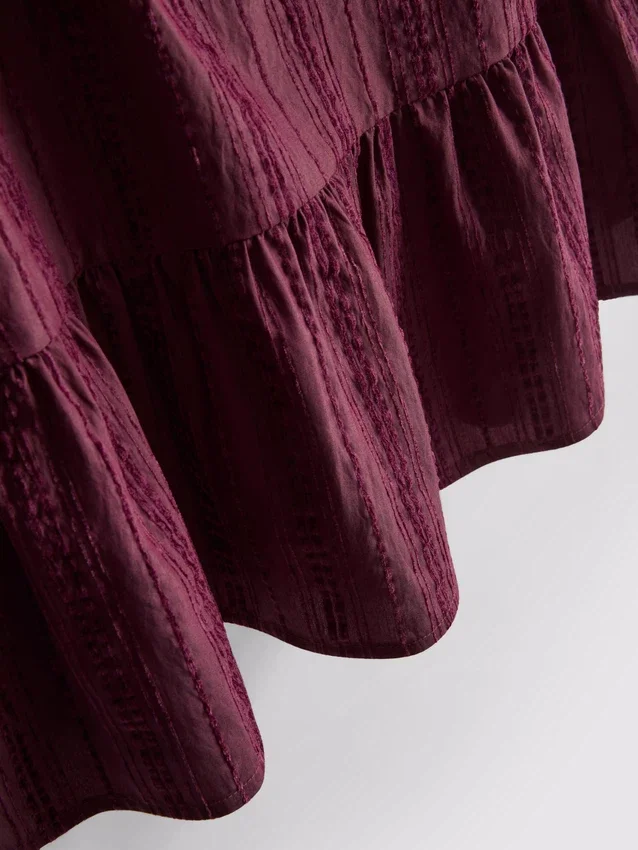 Çizgili peplum etekli tişört Çizgili peplum etekli tişört