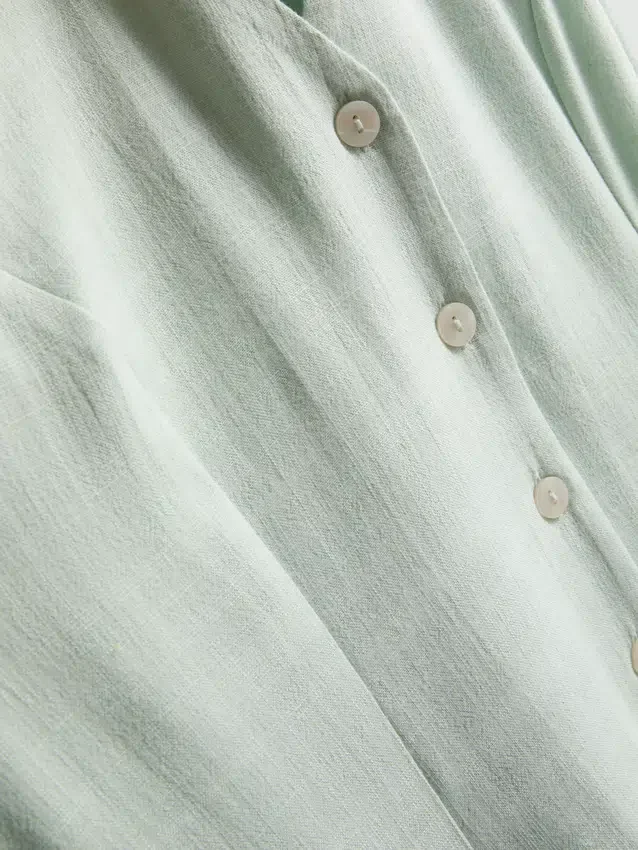 Kolsuz V yakalı mini elbise Kolsuz V yakalı mini elbise