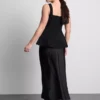 Krep kumaştan, kalp yakalı, peplum detaylı üst Krep kumaştan, kalp yakalı, peplum detaylı üst