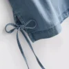Pamuklu denim, yan bağcıklı tişört Pamuklu denim, yan bağcıklı tişört