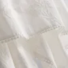 Pamuklu, etek ucu mendil kesimli cami bluz Pamuklu, etek ucu mendil kesimli cami bluz