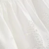 Pamuklu, işlemeli peplum etekli cami bluz Pamuklu, işlemeli peplum etekli cami bluz