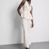 Polka noktalı halter yaka peplum üst Polka noktalı halter yaka peplum üst