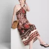 The Edit keten karışımlı baskılı halter midi elbise The Edit keten karışımlı baskılı halter midi elbise