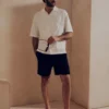 The Edit markalı işlemeli pamuklu kısa kollu şort The Edit markalı işlemeli pamuklu kısa kollu şort