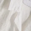 The Edit markalı işlemeli pamuklu kısa kollu şort The Edit markalı işlemeli pamuklu kısa kollu şort