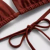 Zincir detaylı üçgen bikini üstü Zincir detaylı üçgen bikini üstü