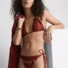 Zincir detaylı, yanları bağlamalı bikini altları